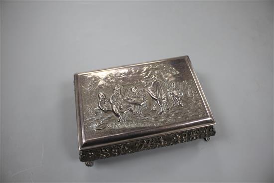 A 20th century continental embossed white metal rectangular bombe shaped cigarette? box, with wood lined interior, 14cm